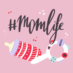 You can handwritten saying #momlife. Hand drawn inspirational lettering. Free hand stylized phrase for your typography, postcard, case, textile, t shirt design.