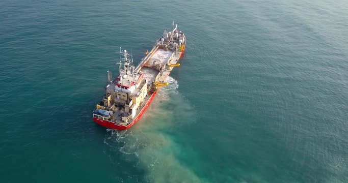 Aerial footage over Sand dredging ship in Mediterranean Sea Drone view over Sand dredging ship in Mediterranean Sea
