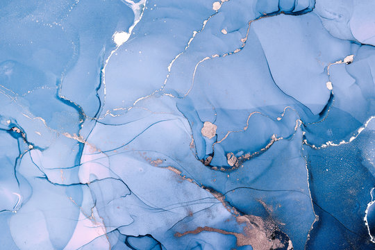 Alcohol ink colors translucent. Abstract multicolored marble texture background. Design wrapping paper, wallpaper. Mixing acrylic paints. Modern fluid art. Alcohol Ink Pattern