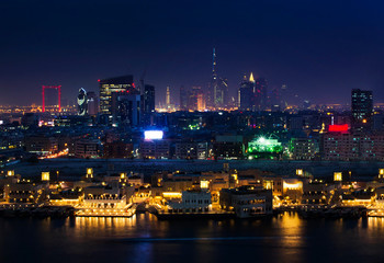 Fototapeta na wymiar Panoramic view of Dubai cityscape and the Dubai creek at night