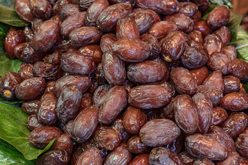 Sweet dried dates. Organic dates displayed in the market 