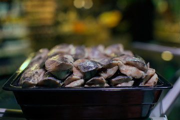 still life, herring for sale in boneless pieces, at the grocery store