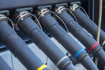 Plugs are inserted into the connectors of electrical equipment for a mobile TV station