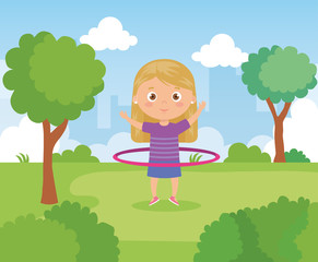 Obraz na płótnie Canvas girl in park with hula hula vector illustration design