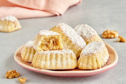 Sweet arabic pastries stuffed with walnuts . Traditional maamoul cookies