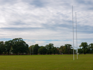 Obraz premium Outside sports field college university goal posts football rugby