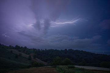 Thunder lightning over cloudy sky