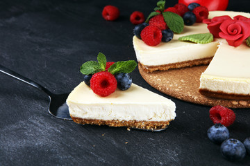 Homemade cheesecake with fresh raspberries and mint for valentines day - healthy organic summer dessert pie cheesecake. Vanilla Cheese Cake for dessert