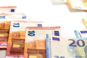 Euro banknotes isolated over white with clipping path