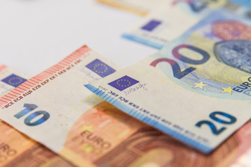 Euro banknotes isolated over white with clipping path