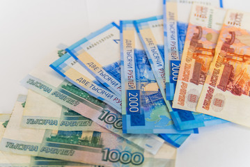 Scattered ruble currency banknotes, closeup view