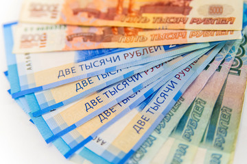Scattered ruble currency banknotes, closeup view