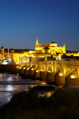 The Roman Bridge over the Guadalquivir river and the Mosque Cathedral of Córdoba, Andalusia, Spain