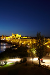 The Roman Bridge over the Guadalquivir river and the Mosque Cathedral of Córdoba, Andalusia, Spain