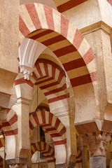 The columns and arches of the Mosque–Cathedral of Córdoba, Andalusia, Spain