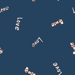 The pattern of the inscriptions "love" and "pease", which are written with a orange marker on a dark blue background.