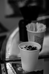 Barista prepares coffee, the process of making coffee in the cafe, the hands of the Barista close-up