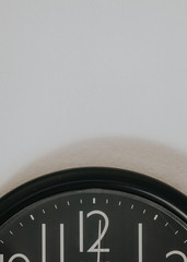 piece of clock on a white wall