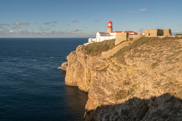 Fototapeta na wymiar Farol do Cabo de Sao Vicente Lighthouse in Sagres, Portugal