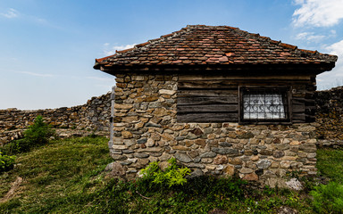 Fototapeta na wymiar old stone house in mountains