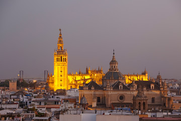 The cathedral Saint Mary of the See at dusk, seen from the top of  the Metropol Parasol, Seville,...