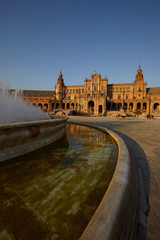 Obraz na płótnie Canvas The fountain and the central building in Plaza de España (Spain Square) in Seville, Spain