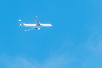 Flight of the plane above the clouds.