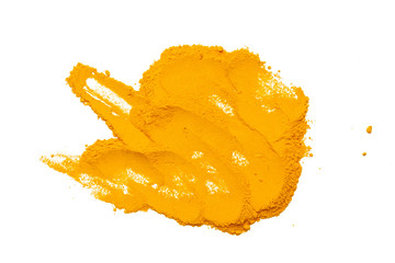 Naklejka na ściany i meble Dry turmeric powder isolated on white background.Close-up of powder orange color turmeric.top view