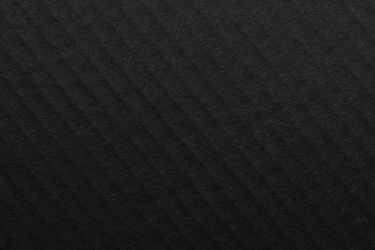 The surface of black paper texture, craft paper cardboard for a background close up