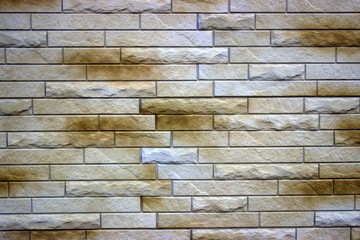 Medium shot of a wall covered with thin, decorative brick, light brown