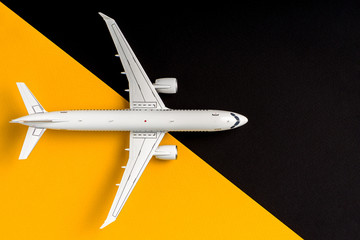Jet airliner on black runway background. Travel and aero space industry concept, booking summer vacation