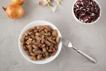 Lobio is a Georgian dish of white and red beans. Beans are a healthy, tasty and satisfying product. Clouse up. Top view.