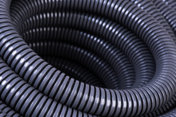 Roll of plastic corrugated pipe for electrical installation close-up