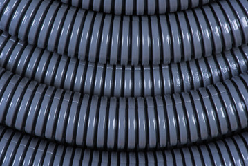 Plastic corrugated pipe tube for electrical installation close-up