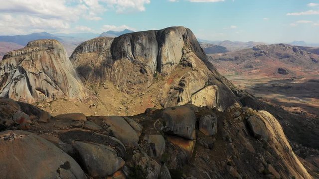 Aerial Drone Shot of Anja Community Reserve in Madagascar with Beautiful Grassy Mountain Woodlands with Fallen Rocks and Wildlife