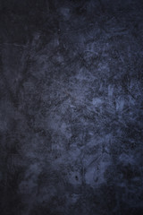Dark concrete background. Wall with plaster.