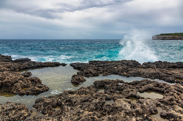 Rocky beach under a gloomy dramatic sky