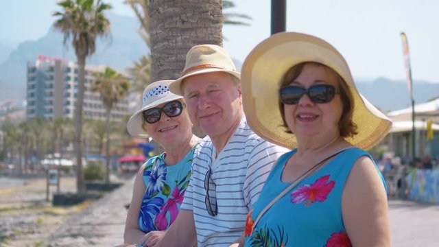 Senior people relaxing on the vacation in 4K slow motion 60fps
