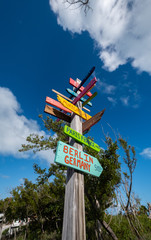 Signs posted with the distances of locations around the world, in Bahia Honda Key in South Florida