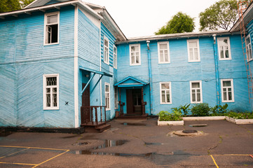 Russia, Blagoveshchensk, July 2019: the house-Museum of Sabina and blue wooden building in the summer