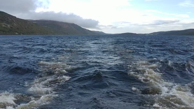 View on the Loch Ness lake near Urquhart Castle in Scotland