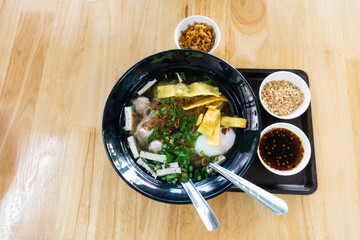 Eating Paste of rice flour on a wooden table detail food.