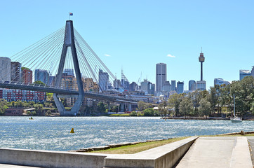 Glebe foreshore walk with a view at Anzac Bridge and Pyrmont suburb, Sydney, Australia