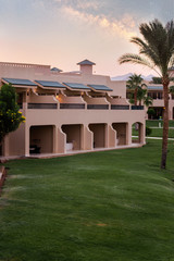 Fototapeta premium Automatic watering of lawns. Landscape. Mechanized water supply to vegetation. Lawn and garden care.