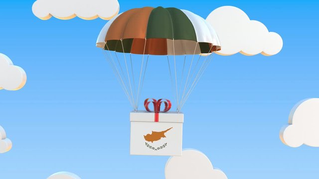Box with national flag of Cyprus falls with a parachute. Loopable conceptual 3D animation