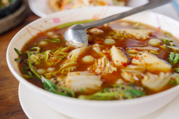 Thai spicy Sour curry soup with Roe or egg giant catfish and vegetable.