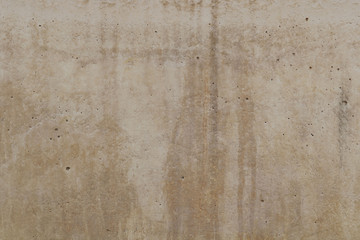 old blank stone wall texture background in white or beige color with moisture