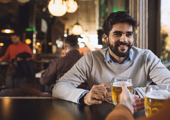 Handsome bearded man in beer pub