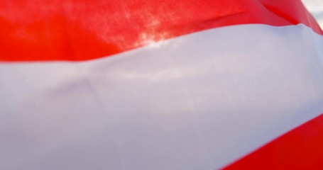 Large developing American flag on a beautiful background of the rising sun - Powered by Adobe