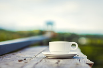 hot cup of coffee on the table.